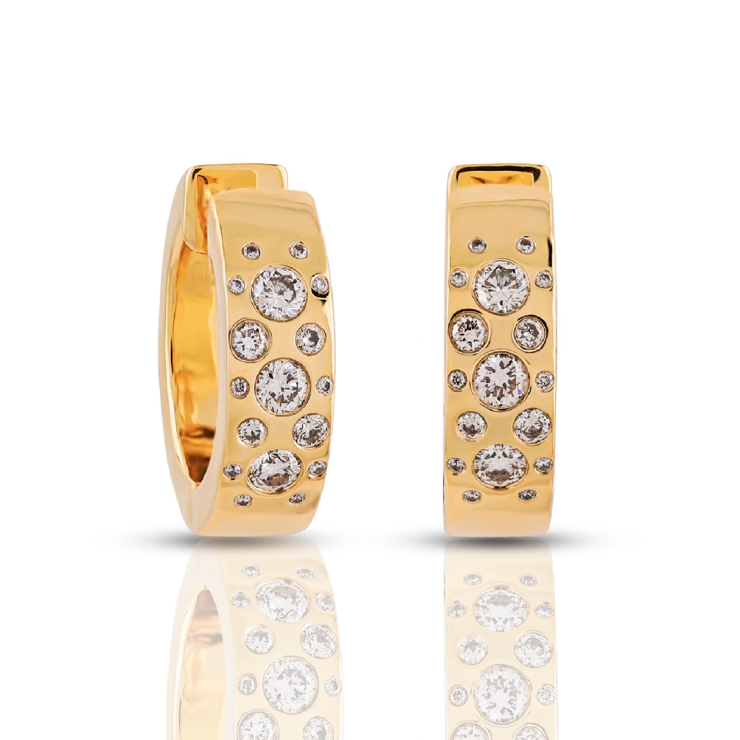 Gold hoop earrings with embedded diamonds on a white background