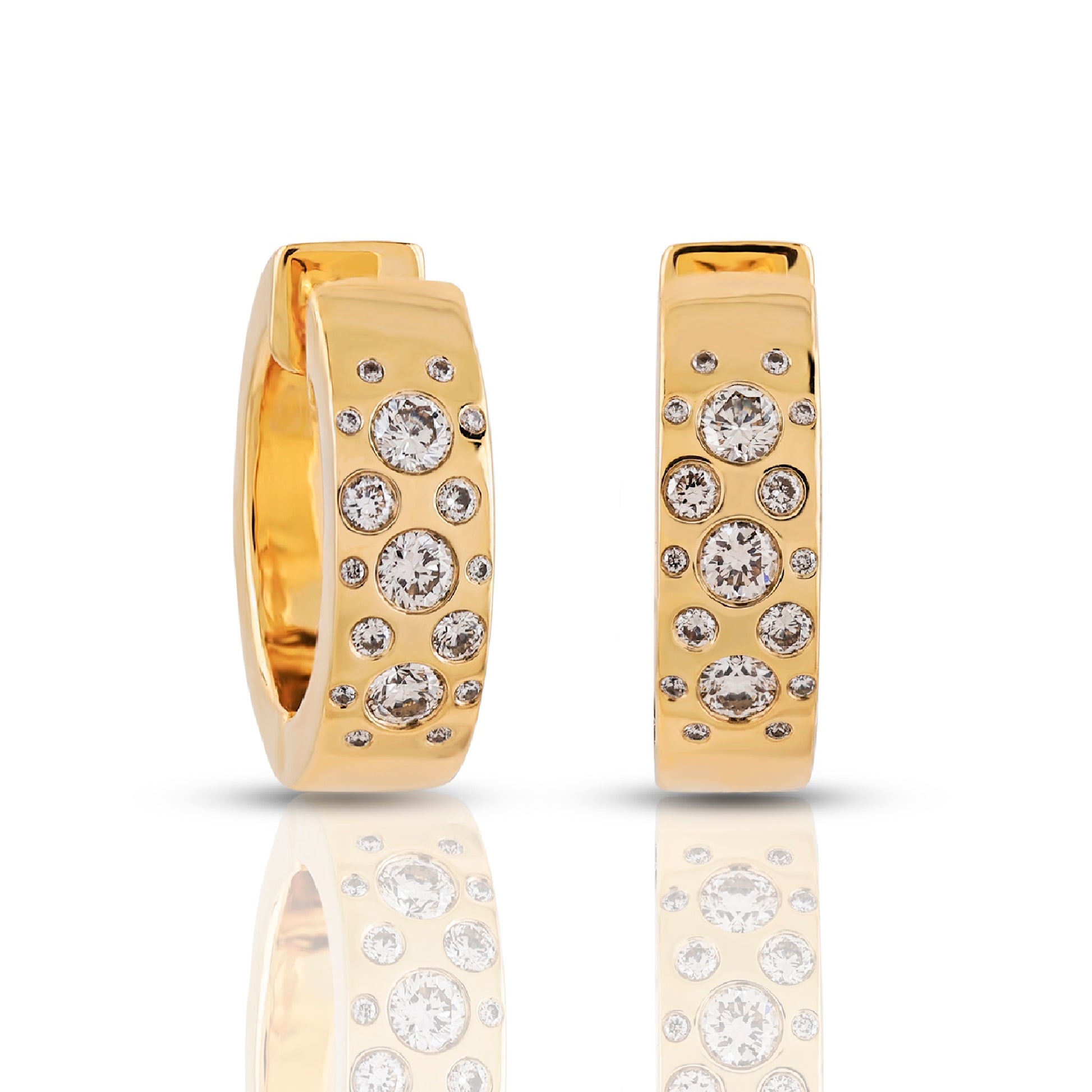 Gold hoop earrings with embedded diamonds on a white background