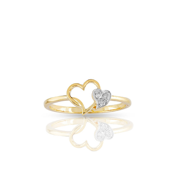 Gold and silver heart-shaped ring on a white background