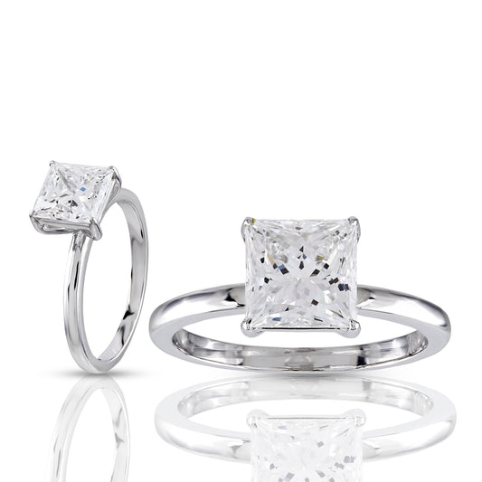 Two diamond rings with square-cut diamonds on a white background