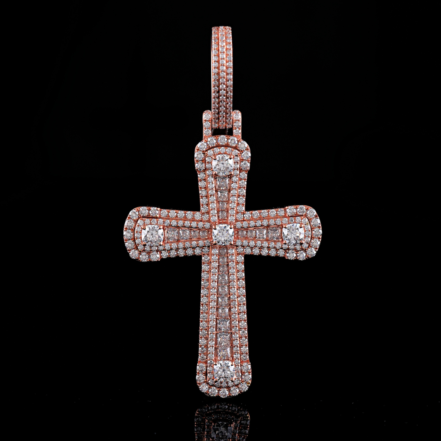 Diamond-studded cross pendant on a black background