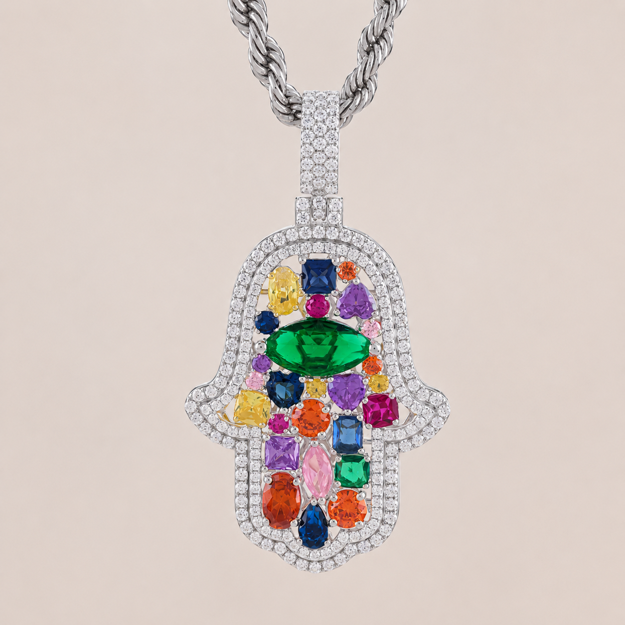 Multicolored gemstone pendant on a beige background