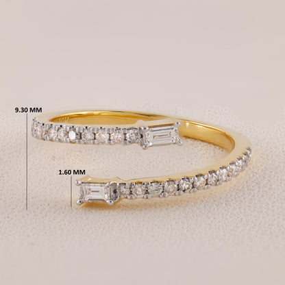 Gold bracelet with diamond accents and measurements on a light gray background