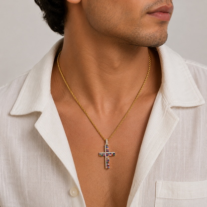 Man wearing a gold necklace with a cross pendant