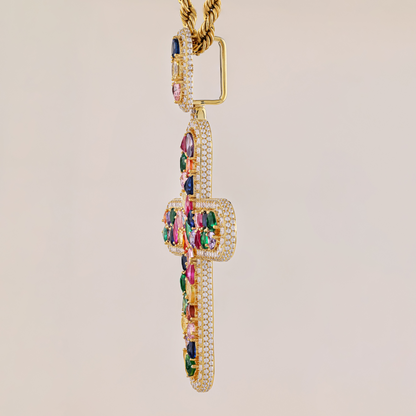 Gold necklace with colorful gemstones on a beige background