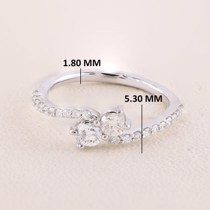 Silver ring with diamond measurements on a beige background