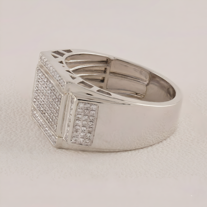 Silver ring with geometric design on a light gray background