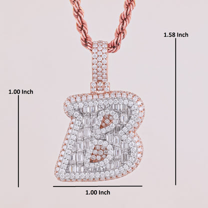 Rose gold and diamond-encrusted 'B' pendant with measurements on a light gray background