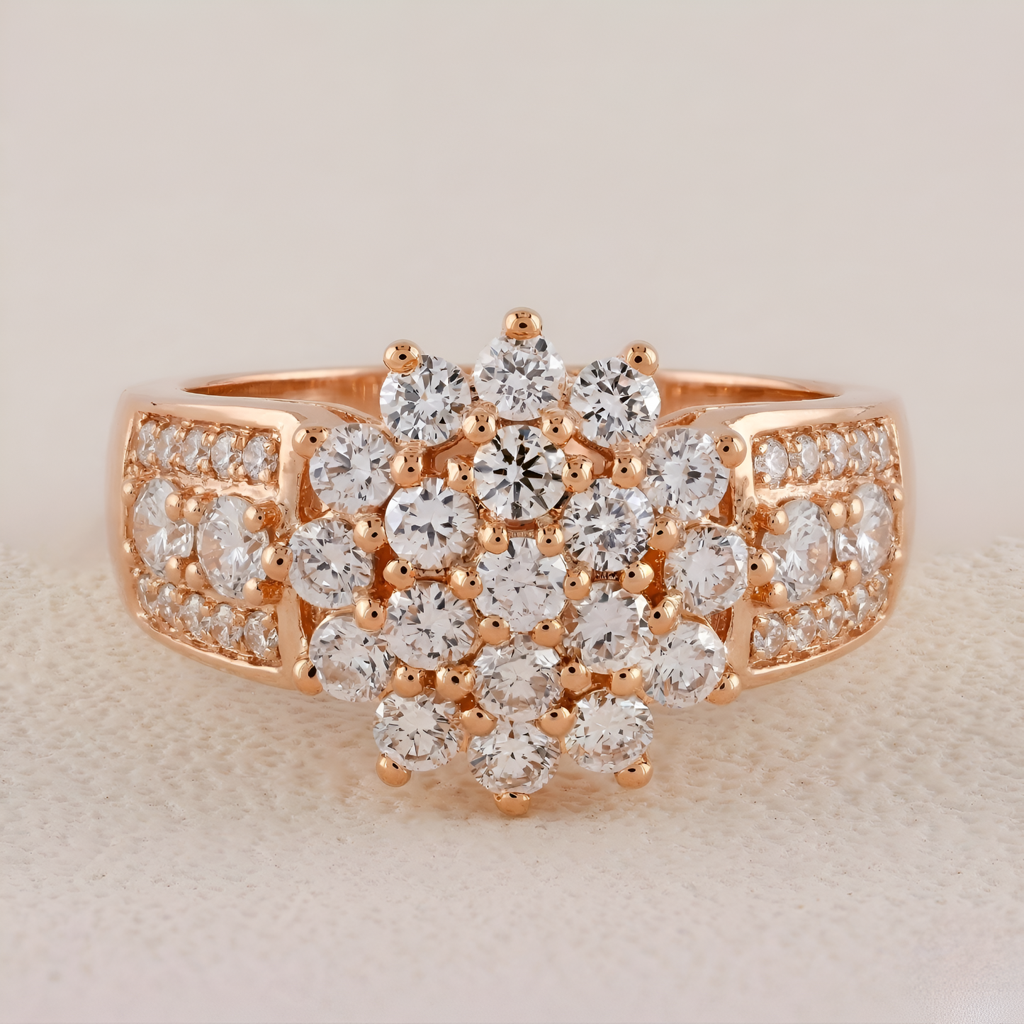 Rose gold ring with diamond stones on a beige background