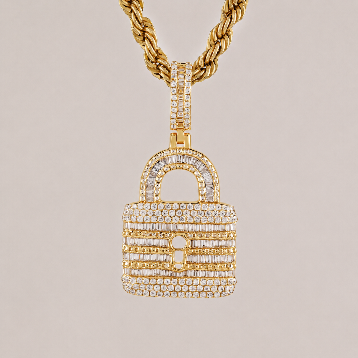 Gold necklace with a diamond-encrusted lock pendant on a beige background