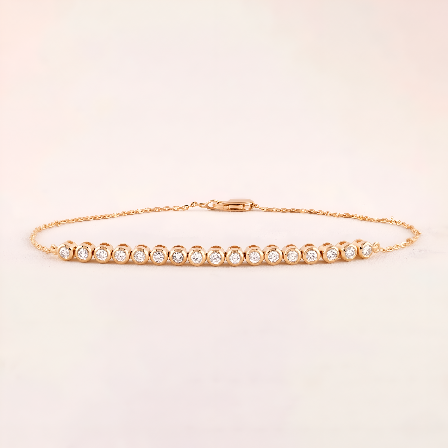 Gold bracelet with small diamonds on a light beige background