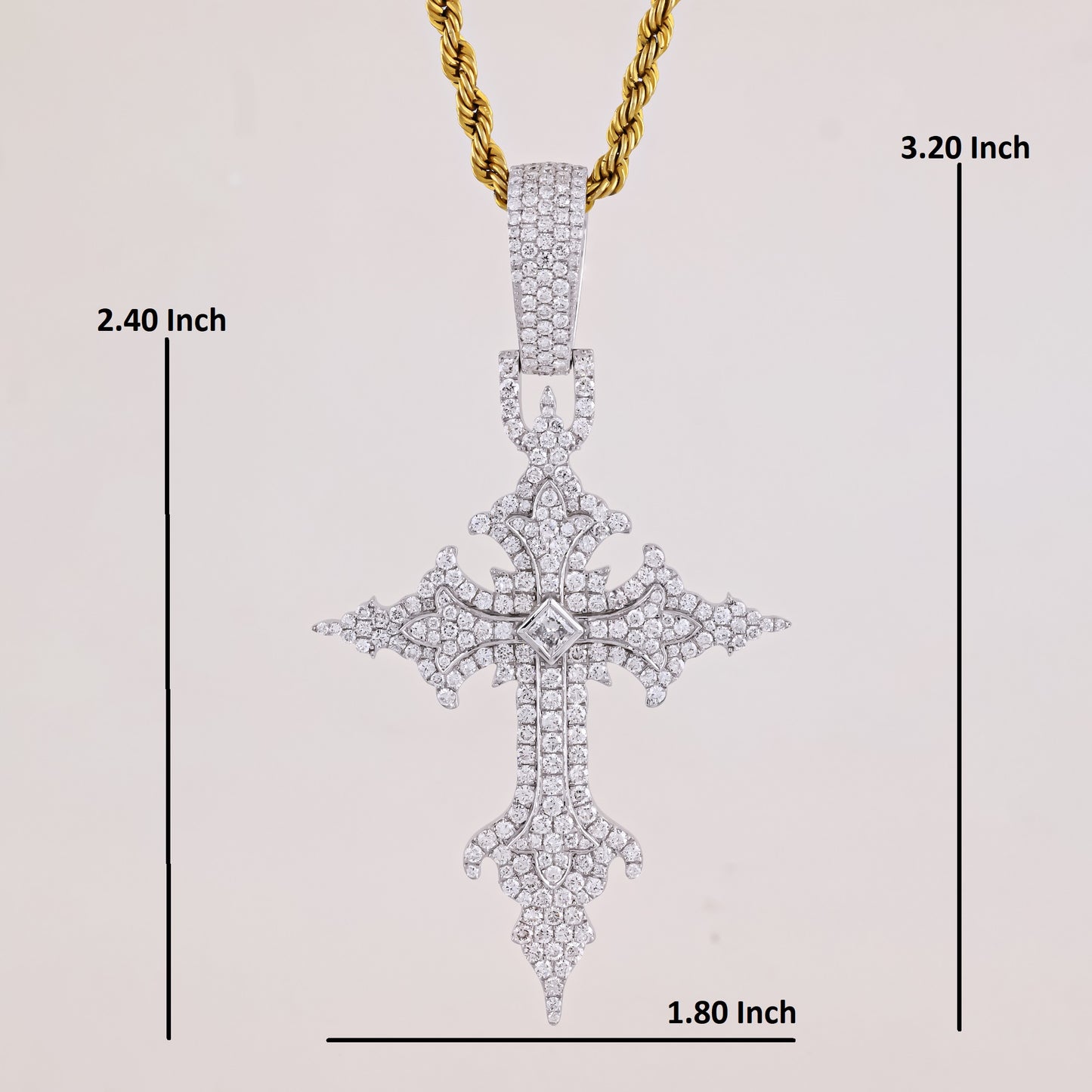 Diamond-studded cross pendant with gold chain, measurements indicated on a light gray background