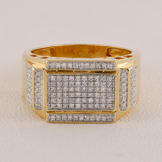 Gold ring with diamond accents on a light gray background