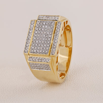 Gold ring with diamond accents on a light gray background