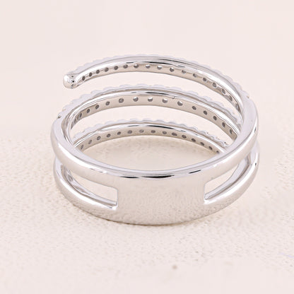 Silver bracelet on a light beige background