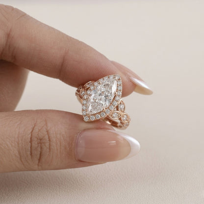 Rose gold ring with a large diamond on a neutral background