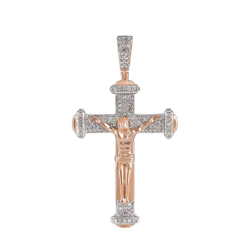A 10k yellow gold crucifix jesus cross pendant adorned with round diamonds.