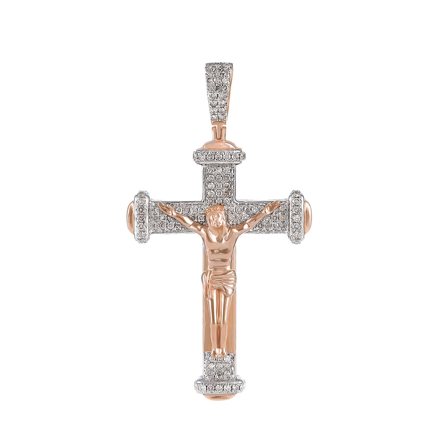 A 10k yellow gold crucifix jesus cross pendant adorned with round diamonds.