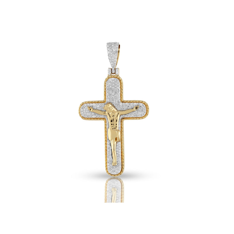 A yellow gold diamond jesus crucifix cross pendant with sparkling diamonds.